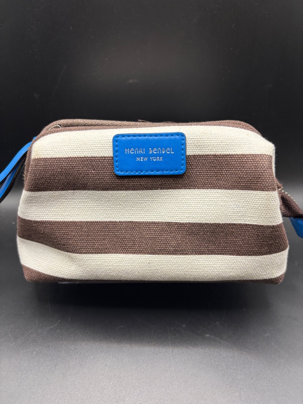 henri bendel Brown and Cream Striped Canvas Toiletry Pouch with Blue Logo Patch